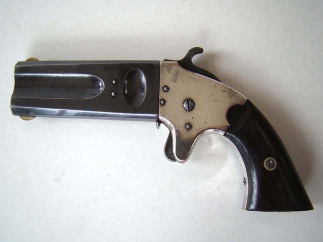 A fine American Arms Company double barrelled over and under Derringer made in 1866 — image 2